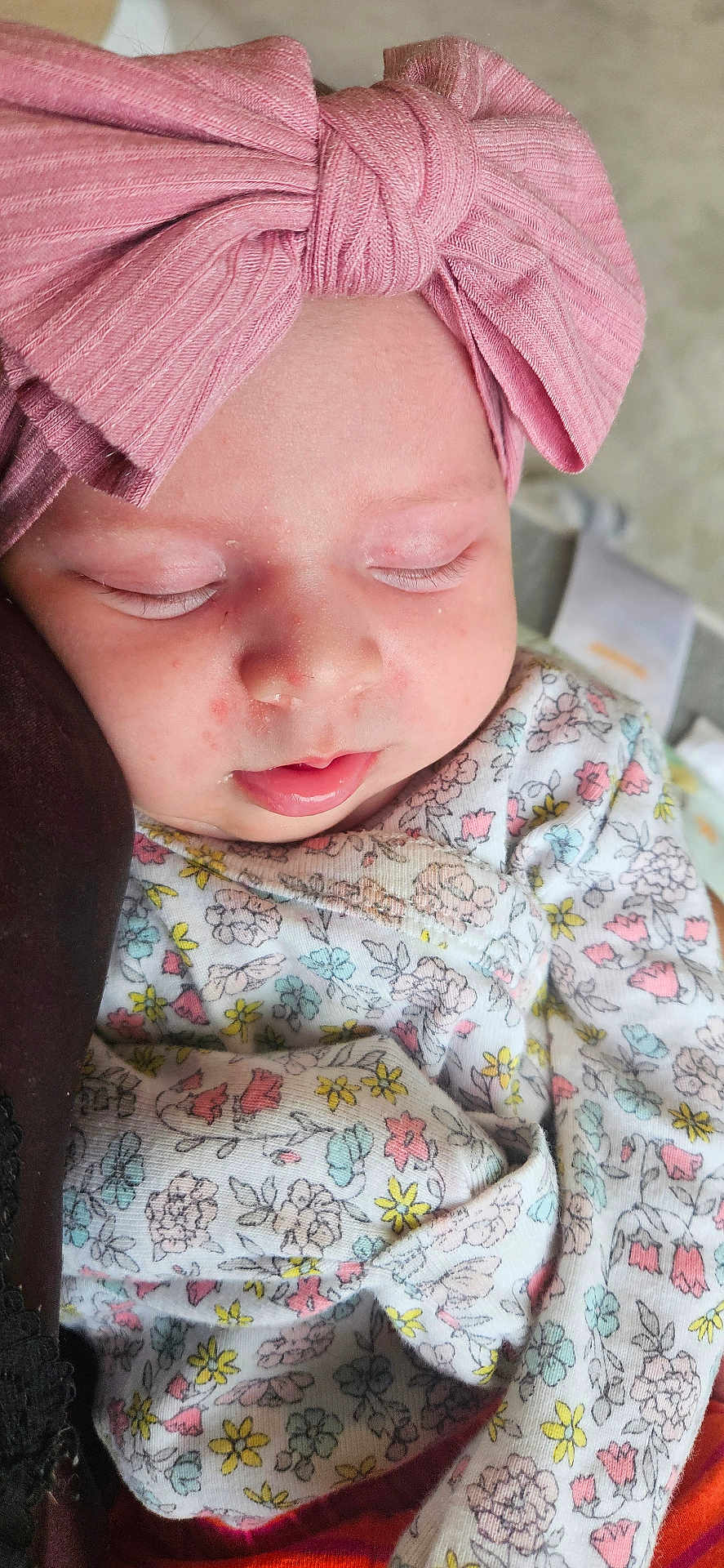 Sage is registered to the contest to win money with this photo: baby, bow, child, closeup, clothing, cute, face, floral, headband, indoors, infant, newborn, peaceful, person, pink, portrait, resting, sleeping, soft, toddler