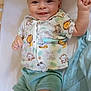 Emillyo a rejoint le concours — aidez-le/la à gagner de superbes lots ! baby, child, smiling, infant, cute, clothing, animal_print, shirt, shorts, lying_down, happy, face, arm, hand, bed, blanket, soft_toys, indoors, portrait, young