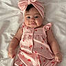 Avani joined the competition — help win amazing prizes! baby, bed, blanket, bonnet, cap, clothing, couch, dress, face, formalwear, furniture, happy, hat, head, newborn, person, photography, portrait, sleeve, smile
