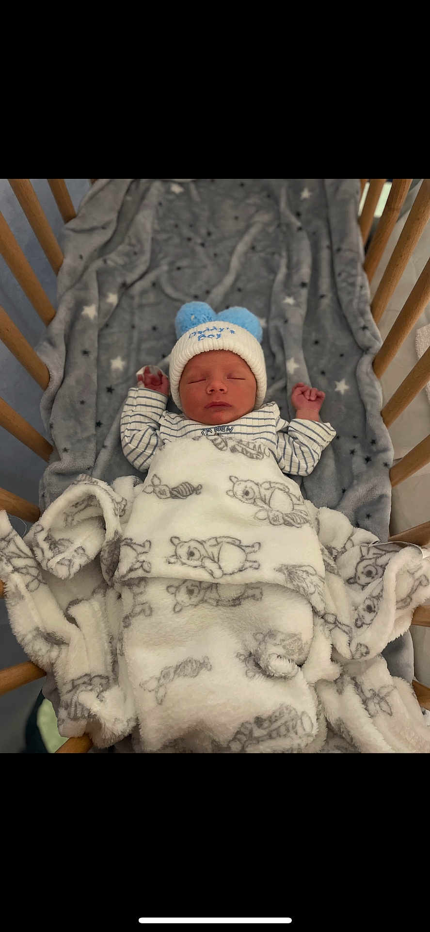 Marley-Jay is registered to the contest to win money with this photo: newborn, baby, crib, blanket, hat, sleeping, wooden, cozy, teddy_bear, pattern, soft, cute, child, infant, indoors, resting, clothing, warm, peaceful, sleep