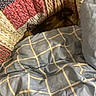 Peji is registered to the contest to win money with this photo: dog, blanket, quilt, bed, bedding, pattern, fabric, cozy, sleeping, resting, indoor, comfort, warm, patchwork, colorful, striped, checkered, animal, pet, fur