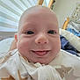 Arthur joined the competition — help win amazing prizes! baby, bed, chubby_cheeks, close_up, cute, eyes, face, happy, head, indoors, infant, onesie, person, pillow, skin, sleepwear, smiling, star_pattern, striped_curtain, tongue_out