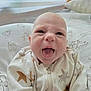 Arthur is registered to the contest to win money with this photo: baby, bed, child, cozy, cute, expression, face, head, indoor, infant, light, onesie, pillow, playful, smile, soft, star_pattern, tongue_out, window_blinds, young