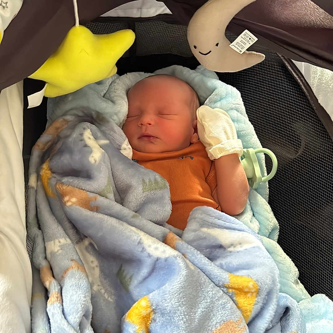 Ezra joined the competition — help win amazing prizes! architecture, baby, bed, bedroom, blanket, building, cradle, crib, face, furniture, head, homedecor, hospital, infantbed, newborn, person, photography, portrait, quilt, sleeping