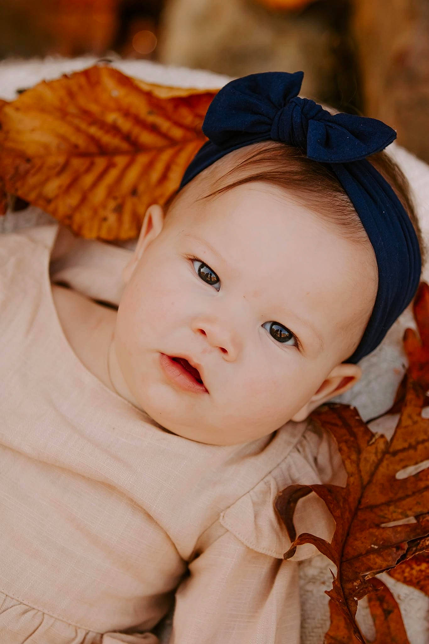 Kinlee is registered to the contest to win money with this photo: baby, baby_toddler_clothing, cheek, child, costume_accessory, ear, eyelash, hair_accessory, headband, headgear, headpiece, human, iris, lip, mouth, nose, peach, person, portrait_photography, skin