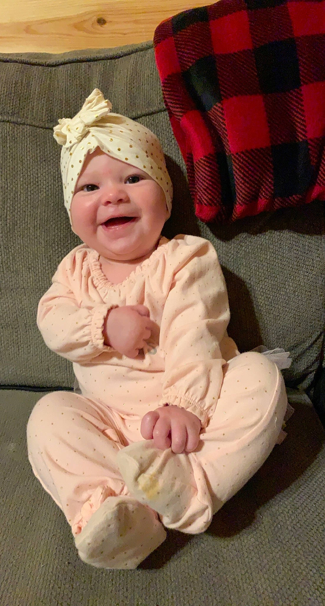 Kinlee joined the competition — help win amazing prizes! baby, baby_products, baby_toddler_clothing, bonnet, cheek, comfort, costume_accessory, embellishment, headgear, headwear, nose, peach, person, pink, plaid, sitting, tartan, textile, toddler, wool
