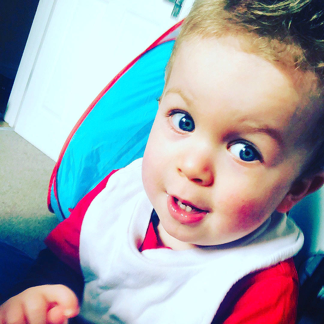 Ronnie is registered to the contest to win money with this photo: baby, baby_toddler_clothing, cheek, chin, cool, electric_blue, eyebrow, eyelash, flash_photography, forehead, fun, happy, iris, jaw, lip, mouth, nose, person, skin, smile