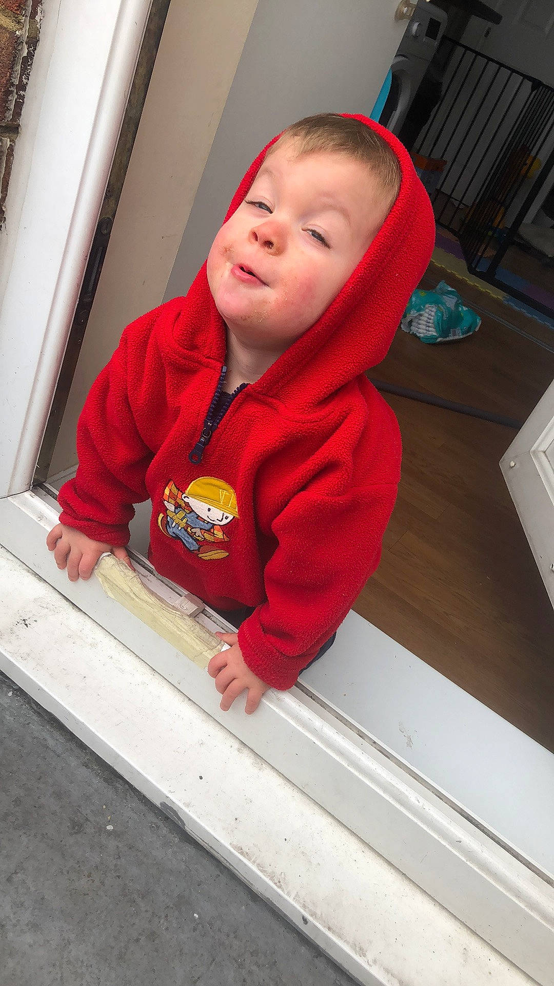 Ronnie joined the competition — help win amazing prizes! baby, baby_safety, baby_toddler_clothing, carmine, cheek, child, cleanliness, comfort, composite_material, floor, flooring, fun, jacket, nose, person, play, sitting, sleeve, toddler, window