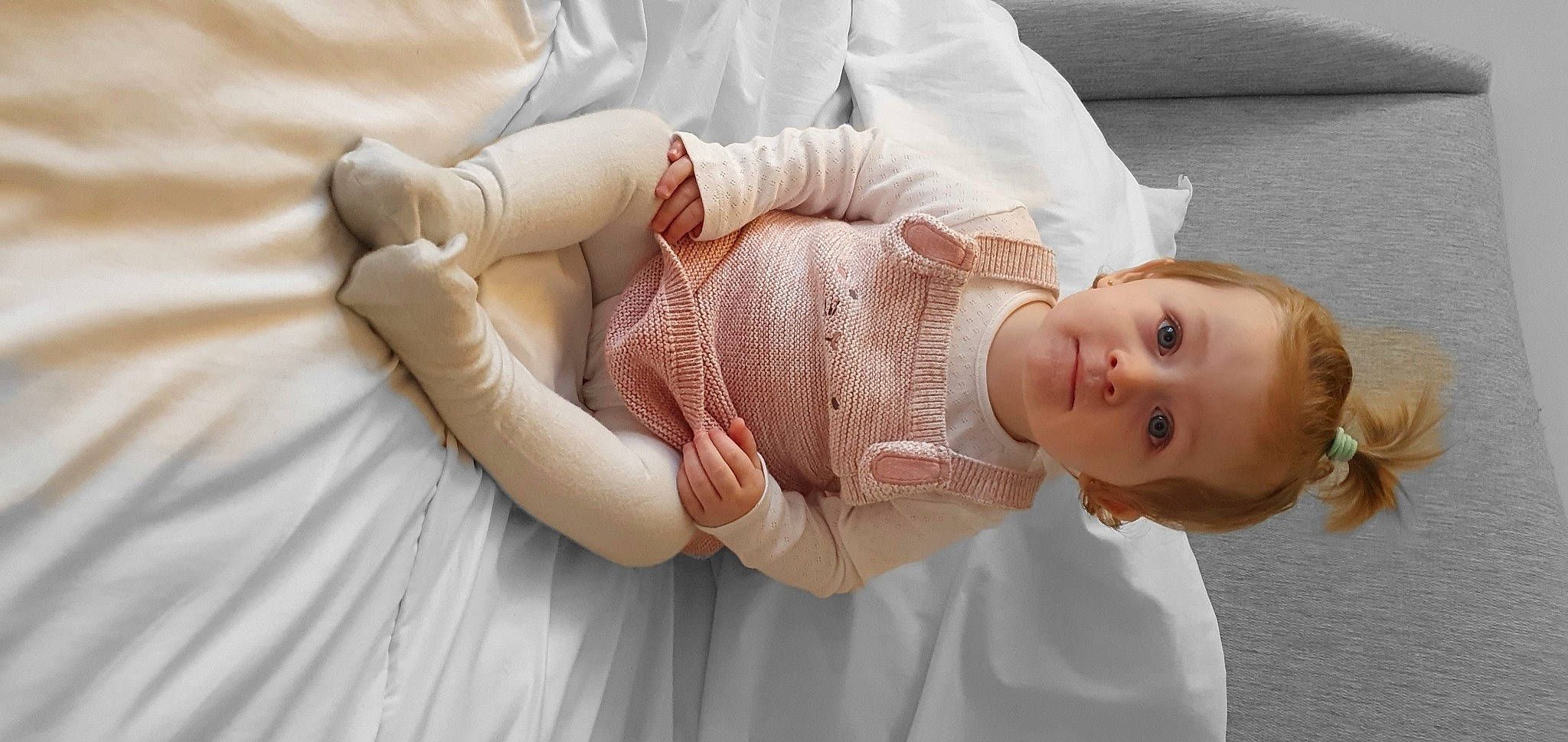 Dolly joined the competition — help win amazing prizes! arm, baby, baby_toddler_clothing, cheek, comfort, dress, eye, face, finger, gesture, hand, head, human_body, joint, leg, lip, neck, nose, person, skin