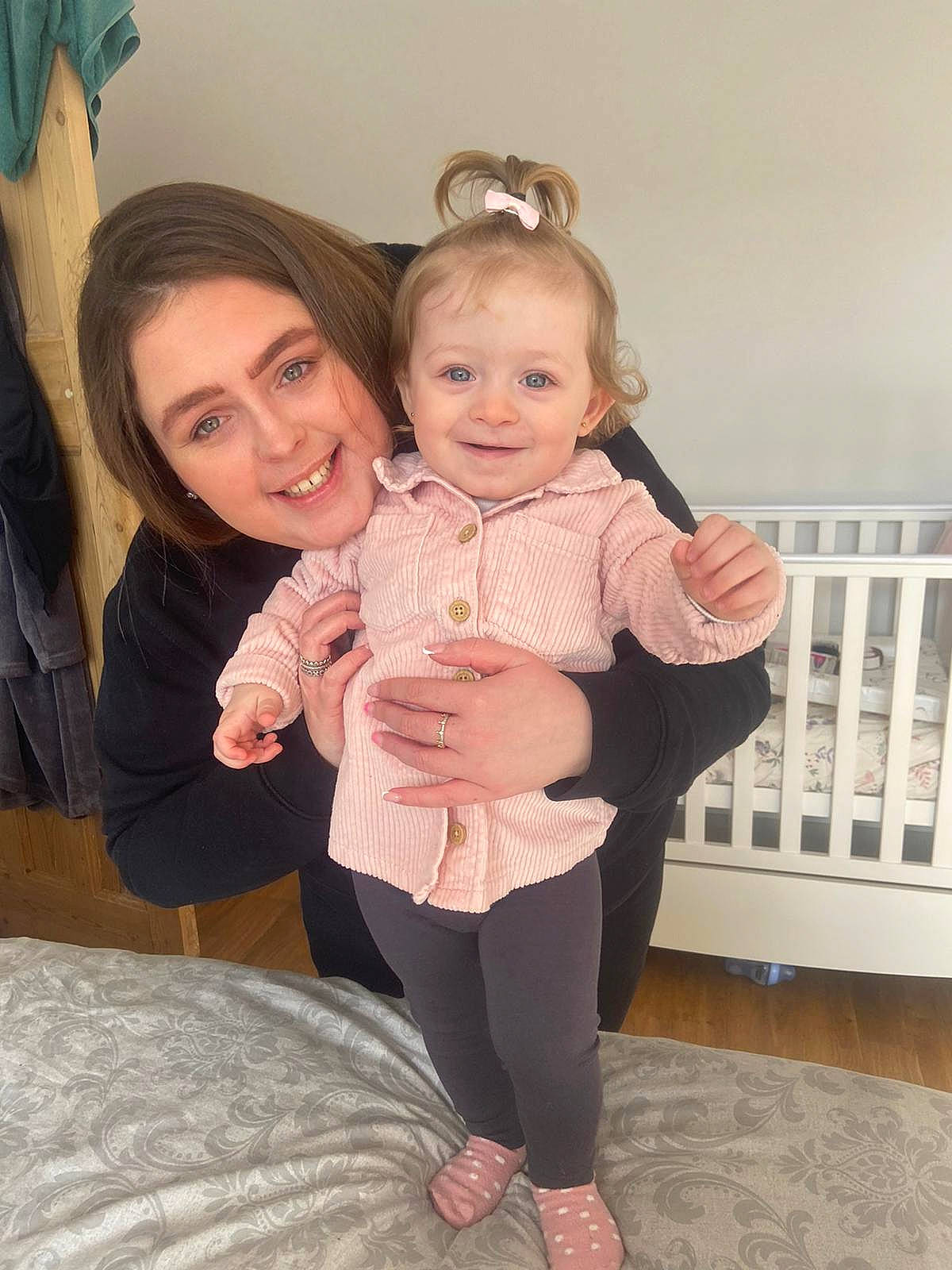 Dolly joined the competition — help win amazing prizes! arm, baby, baby_toddler_clothing, comfort, event, face, finger, gesture, happy, head, human_body, interaction, iris, joy, leg, person, pink, shoulder, skin, smile