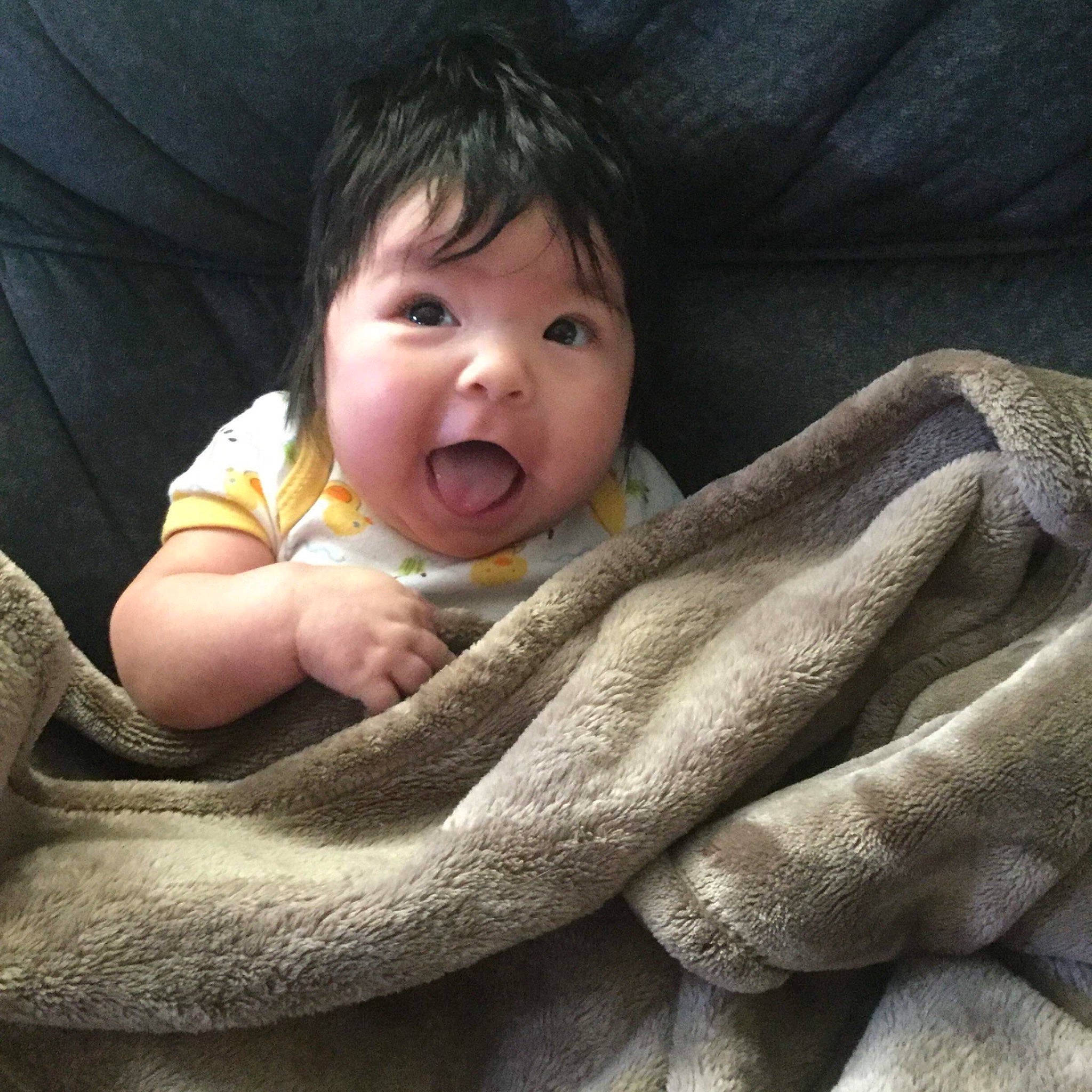 Scarlett joined the competition — help win amazing prizes! baby, boa, boa_constrictor, child, finger, hand, happy, jaw, mouth, nose, person, scaled_reptile, skin, smile, snake, surprise, toddler