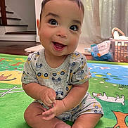 Leo joined the competition — help win amazing prizes! baby, infant, child, smiling, sitting, play_mat, indoors, curtains, floor, clothing, pattern, hands, feet, face, eyes, happy, wood_floor, stairs, basket, natural_light