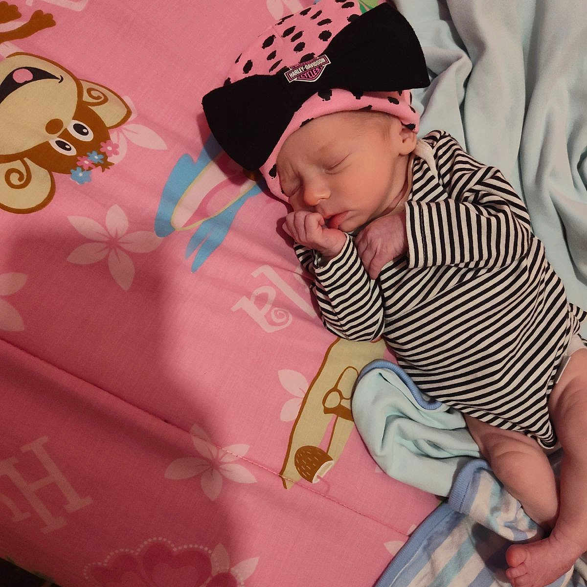 Miracle joined the competition — help win amazing prizes! baby, bed, bedroom, blanket, cap, clothing, cushion, face, furniture, hat, head, homedecor, indoors, newborn, person, photography, portrait, quilt, room, sleeping