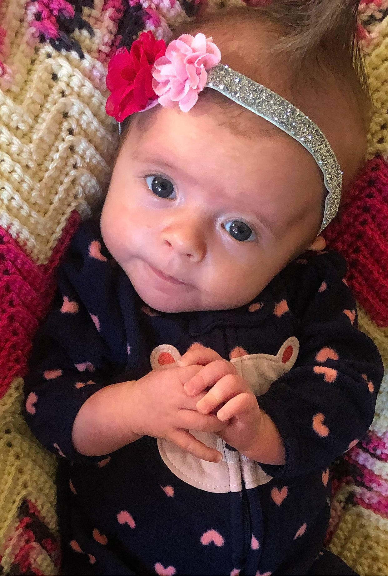 Haisley is registered to the contest to win money with this photo: baby, baby_toddler_clothing, cheek, dress, eye, eyelash, finger, hand, hat, head, headgear, lip, magenta, person, pink, plant, purple, skin, sleeve, textile