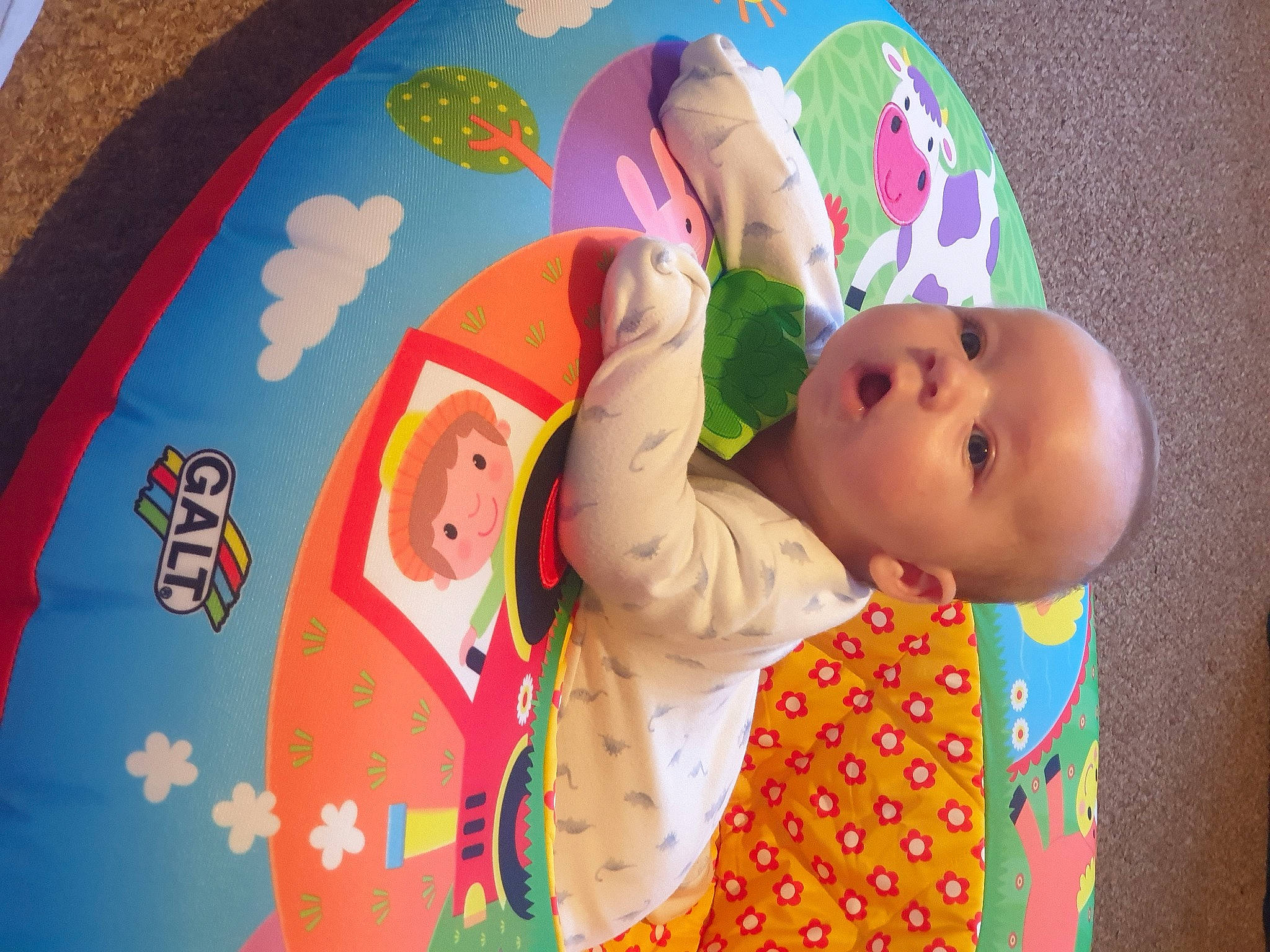 Dante joined the competition — help win amazing prizes! art, baby, baby_products, baby_toddler_clothing, bedtime, cheek, comfort, fun, hand, happy, linens, orange, pattern, person, pink, play, room, sleeve, t_shirt, textile