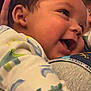 Kamari joined the competition — help win amazing prizes! baby, child, smiling, face, closeup, infant, clothing, pattern, skin, person, happy, cute, eyelashes, ear, mouth, cheeks, soft, holding, warm, joy