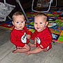 Chloe joined the competition — help win amazing prizes! baby, infant, child, toddler, red_clothing, matching_outfits, floor, play_mat, toy, indoor, person, cute, blue_eyes, sitting, expression, furniture, baby_gear, play, home, smile