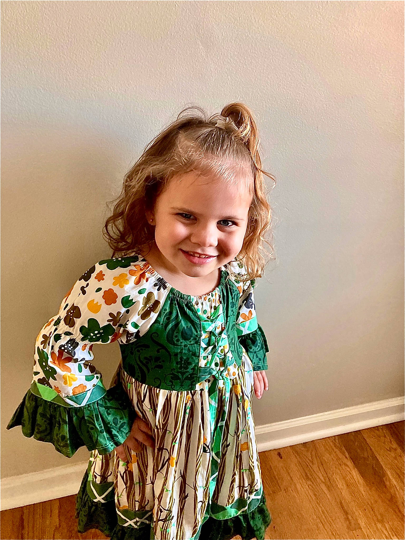 Amira joined the competition — help win amazing prizes! baby_toddler_clothing, brown_hair, child, clothing, day_dress, dress, fashion_design, flooring, formal_wear, happy, joy, magenta, outerwear, pattern, peach, person, sleeve, smile, standing, toddler