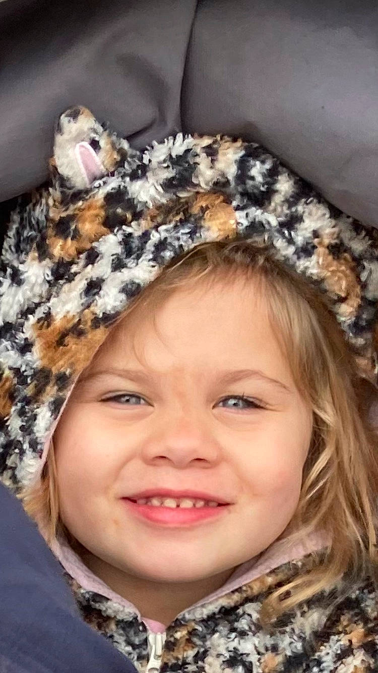 Amira is registered to the contest to win money with this photo: cap, cheek, child, eye, face, fashion_accessory, flash_photography, fun, happy, head, headgear, iris, joy, lip, nose, outerwear, person, skin, smile, toddler