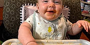 Huntlee joined the competition — help win amazing prizes! baby, bib, child, clothing, cute, expression, face, food, hand, happy, high_chair, indoor, kitchen, mess, messy, person, seat, smiling, spaghetti, table