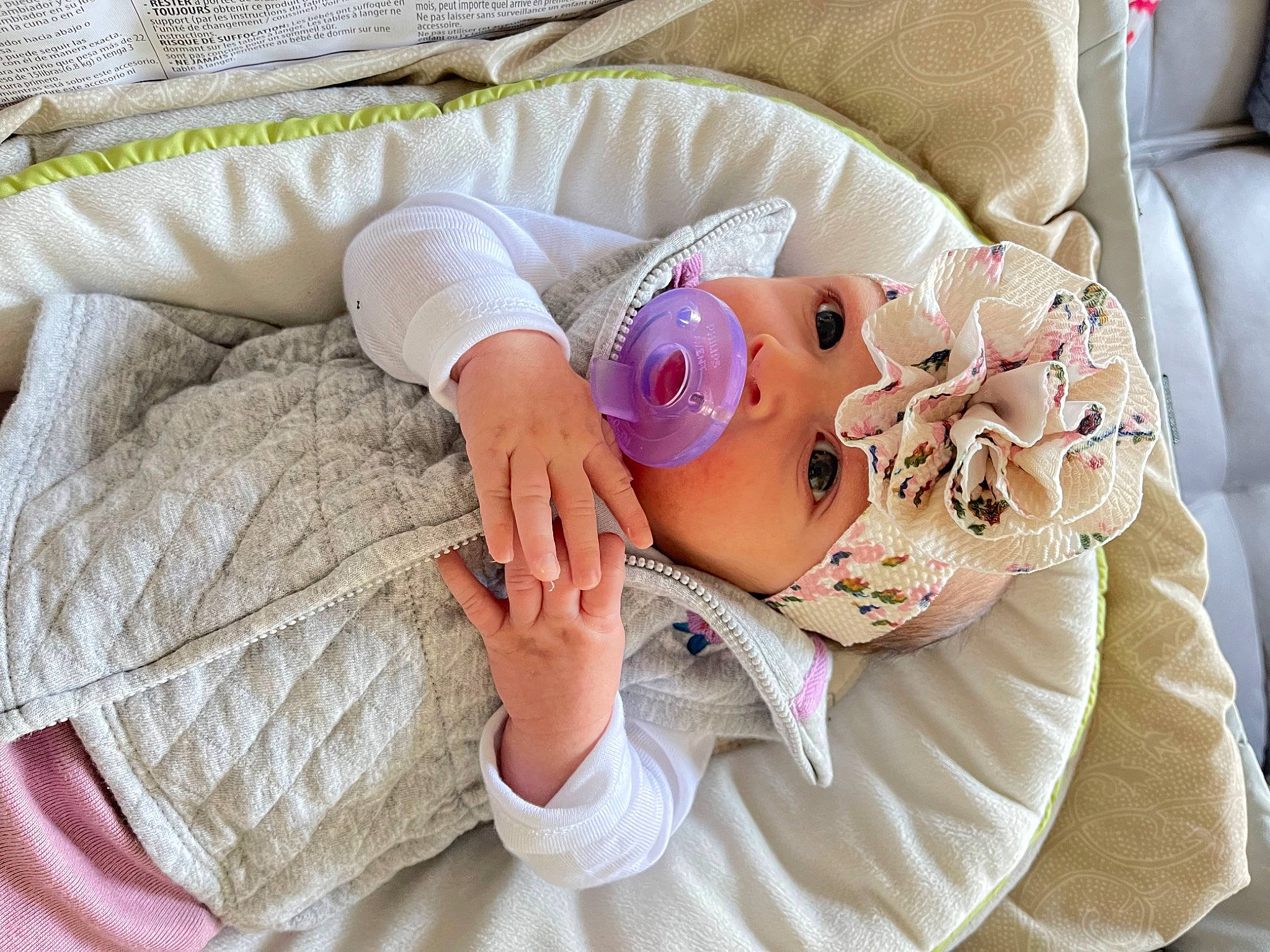 Valentina is registered to the contest to win money with this photo: baby, baby_products, baby_sleeping, baby_toddler_clothing, bedding, child, comfort, couch, headwear, linens, nail, pattern, person, pink, product, room, skin, sleeve, sunglasses, textile