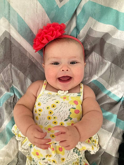 Gracie joined the competition — help win amazing prizes! baby, baby_toddler_clothing, child, comfort, dress, eye, face, happy, hat, head, joy, linens, lip, pattern, person, pink, skin, sleeve, smile, sun_hat