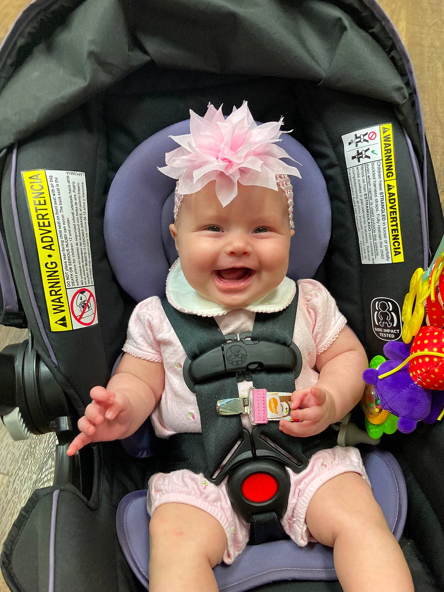Gracie joined the competition — help win amazing prizes! auto_part, baby, baby_carriage, baby_products, baby_toddler_clothing, car_seat, child, comfort, facial_expression, fashion_accessory, fun, happy, headgear, headwear, joy, lap, person, personal_protective_equipment, pink, skin