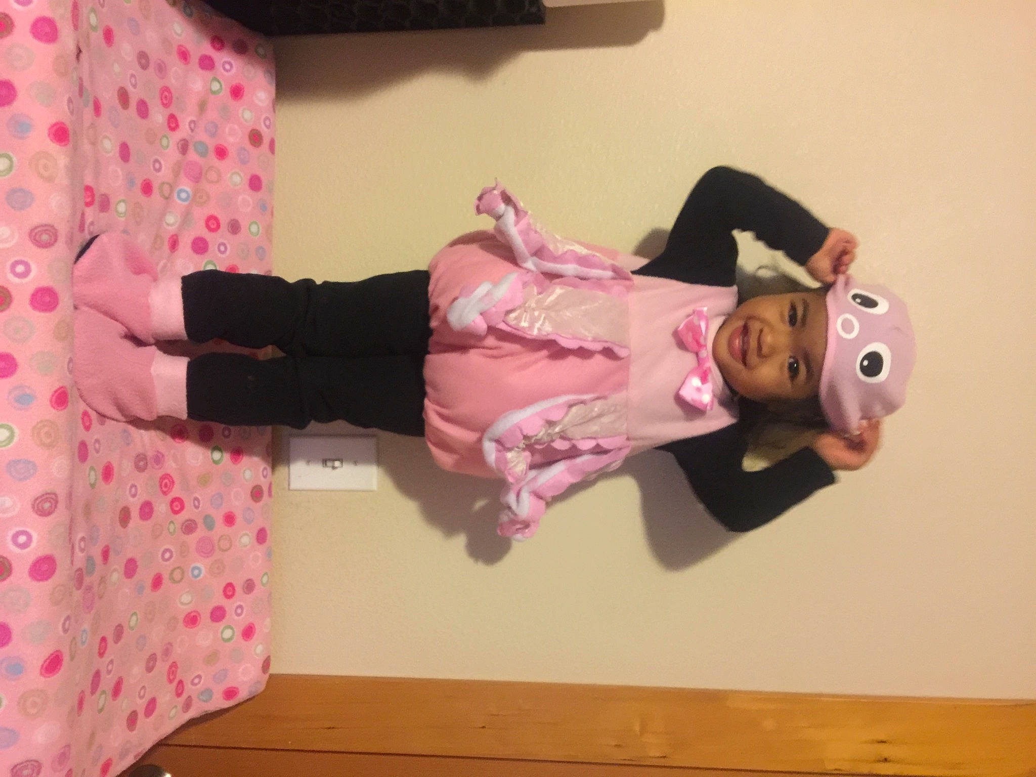 Shalianne joined the competition — help win amazing prizes! baby_toddler_clothing, beauty, child, costume, flooring, fun, hardwood, headwear, joint, magenta, pattern, peach, person, pink, room, sleeve, smile, sock, thigh, toddler