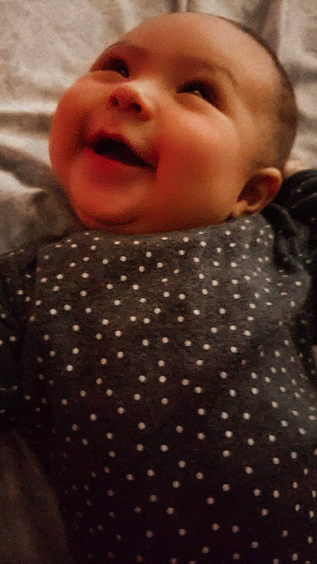 Ana is registered to the contest to win money with this photo: baby, baby_laughing, baby_products, baby_toddler_clothing, beauty, black, cheek, child, collar, comfort, happy, laugh, organ, pattern, person, portrait_photography, sleeve, smile, textile, toddler