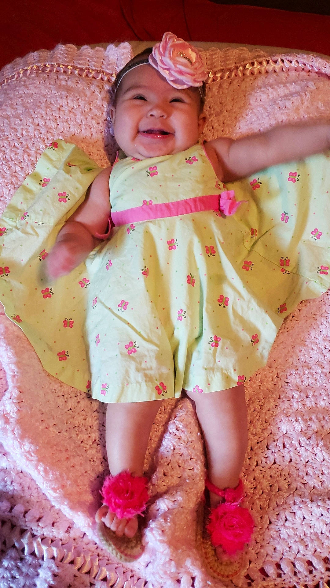 Ana is registered to the contest to win money with this photo: baby, baby_toddler_clothing, cheek, child, clothing, dress, finger, hand, happy, headgear, headwear, iris, joy, magenta, pattern, person, pink, skin, sleeve, smile