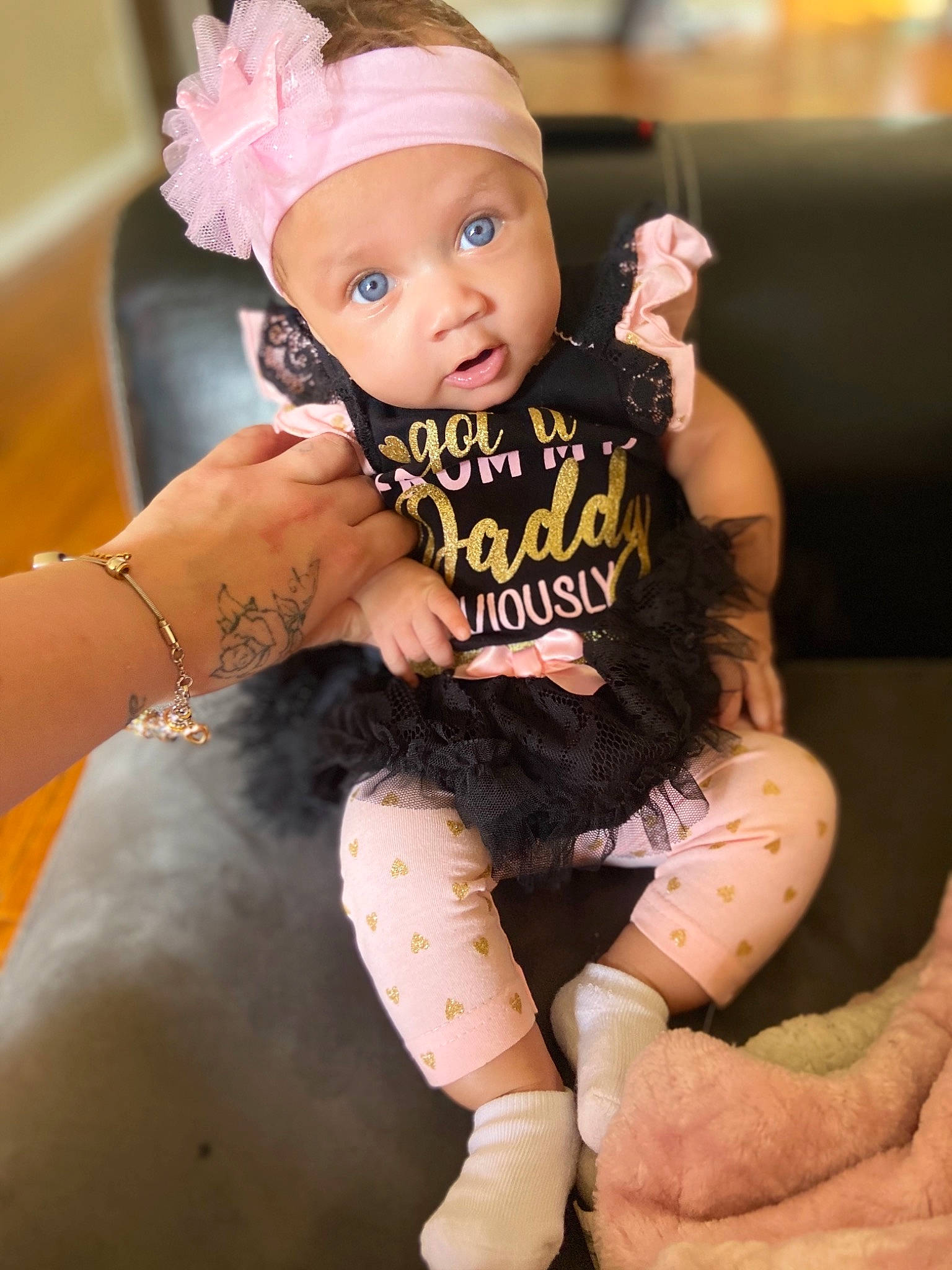 Serena is registered to the contest to win money with this photo: arm, baby, cheek, child, child_model, costume, face, finger, hand, head, headwear, leg, person, photography, skin, thumb, toddler, yellow