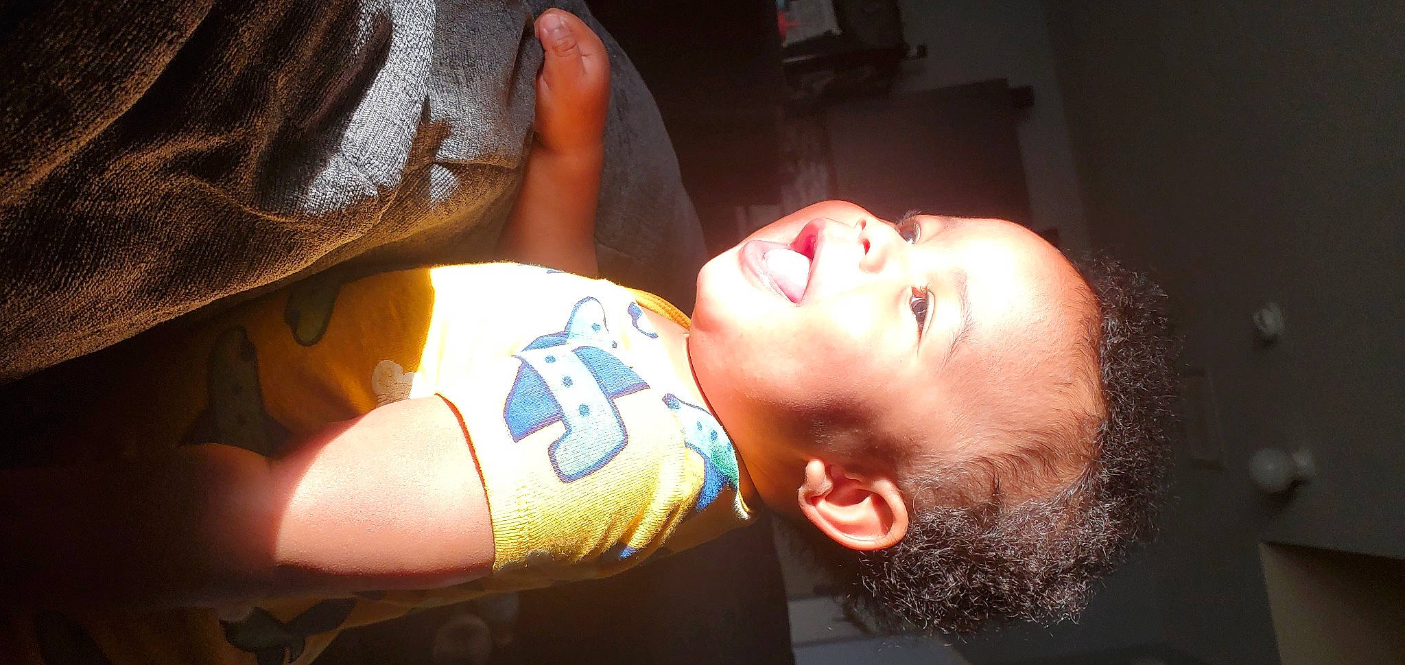 Marcel is registered to the contest to win money with this photo: arm, black_hair, cheek, chin, cool, elbow, eyelash, facial_expression, finger, flash_photography, happy, lip, mouth, muscle, neck, nose, orange, person, skin, smile