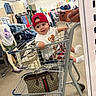 Michael joined the competition — help win amazing prizes! baby, casual_clothing, child, clothes, clothing_store, floor, handbag, indoor, mannequin, mirror, pants, person, red_cap, reflection, retail, shopping, shopping_cart, smiling, socks, toddler