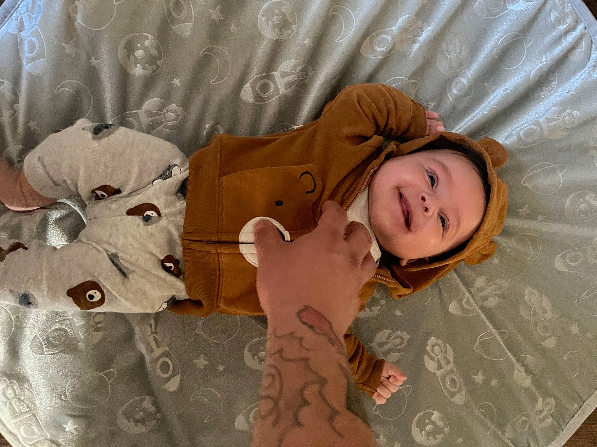 Enzalo joined the competition — help win amazing prizes! baby_toddler_clothing, bedding, child, comfort, fashion_accessory, flooring, fur, happy, head, linens, pattern, peach, person, pink, room, sleeve, smile, wood