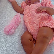 Brianna is registered to the contest to win money with this photo: baby, sleeping, pink, headband, blanket, soft, cute, infant, footwear, pearls, flower, accessory, child, adorable, resting, clothing, toddler, skin, pose, peaceful