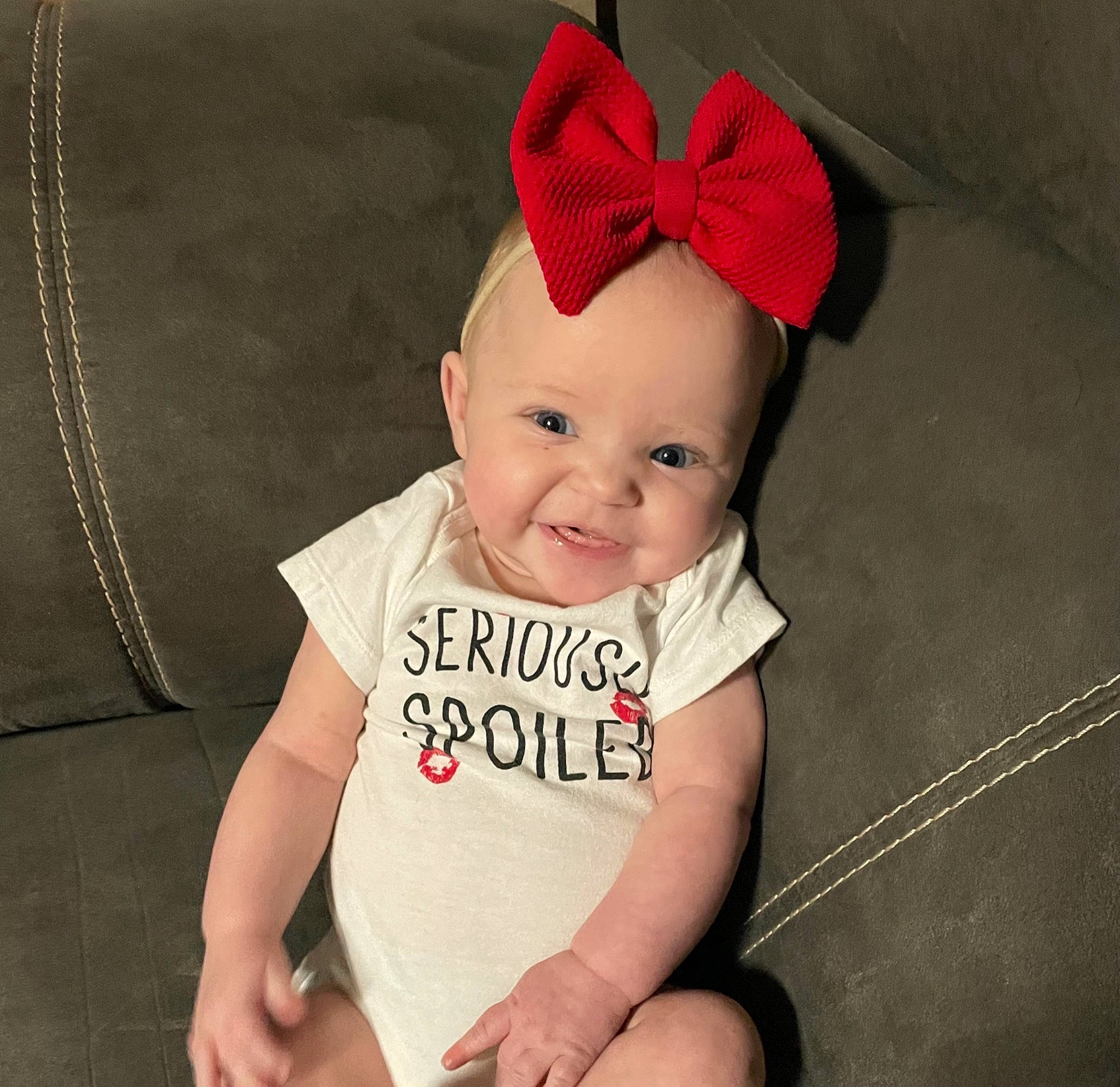 Tinlee joined the competition — help win amazing prizes! baby, baby_toddler_clothing, beanie, cap, carmine, child, costume_accessory, costume_hat, event, fashion_accessory, fun, hair_accessory, happy, holiday, joy, party_supply, person, sitting, sleeve, smile