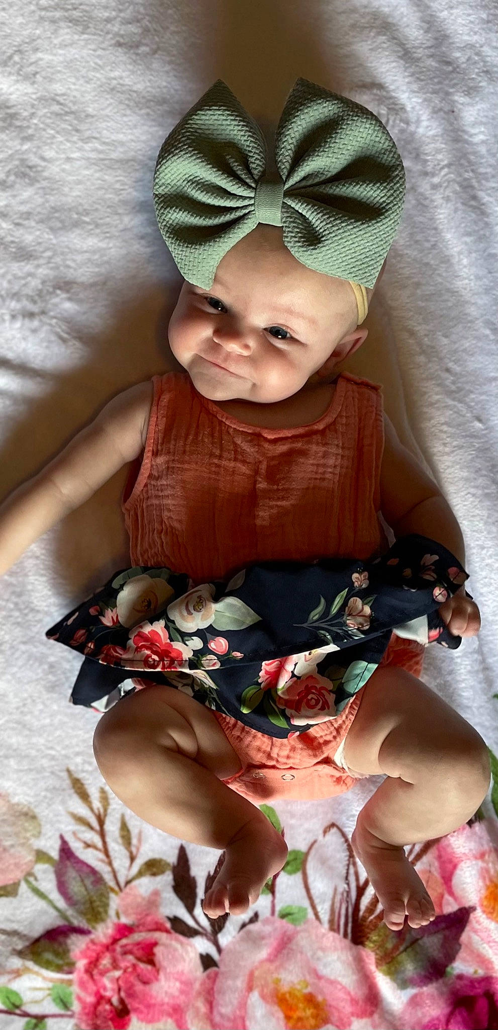 Tinlee is registered to the contest to win money with this photo: baby, baby_toddler_clothing, cap, cheek, child, comfort, dress, eye, facial_expression, finger, happy, head, leg, pink, skin, sleeve, smile, textile, thigh, toddler