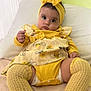 baby, yellow, headband, socks, knitted, bed, infant, cute, clothing, portrait, child, indoors, soft, looking, expression, person, closeup, fashion, cozy, young