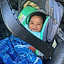 Kyzeir Walker joined the competition — help win amazing prizes! baby, car_seat, blanket, smiling, child, infant, seat, car_interior, blue, clothing, happy, person, transportation, cute, head, safety, portrait, curly_hair, indoors, seatbelt