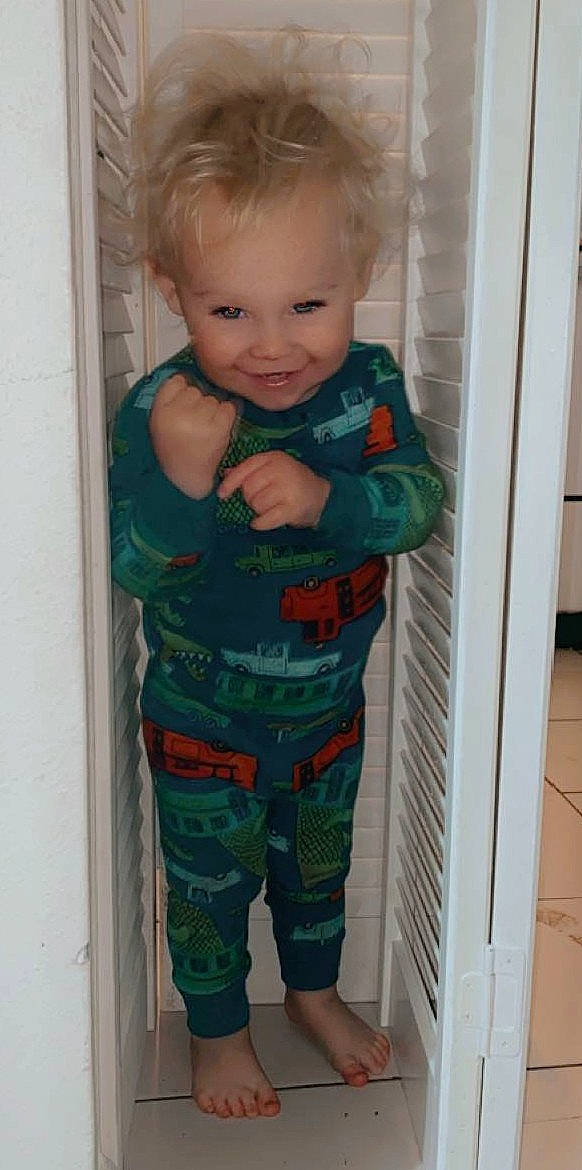 Carson joined the competition — help win amazing prizes! baby, baby_toddler_clothing, bermuda_shorts, camouflage, cargo_pants, cheek, child, chin, eye, fun, iris, joy, pattern, person, room, shorts, skin, sleeve, smile, standing