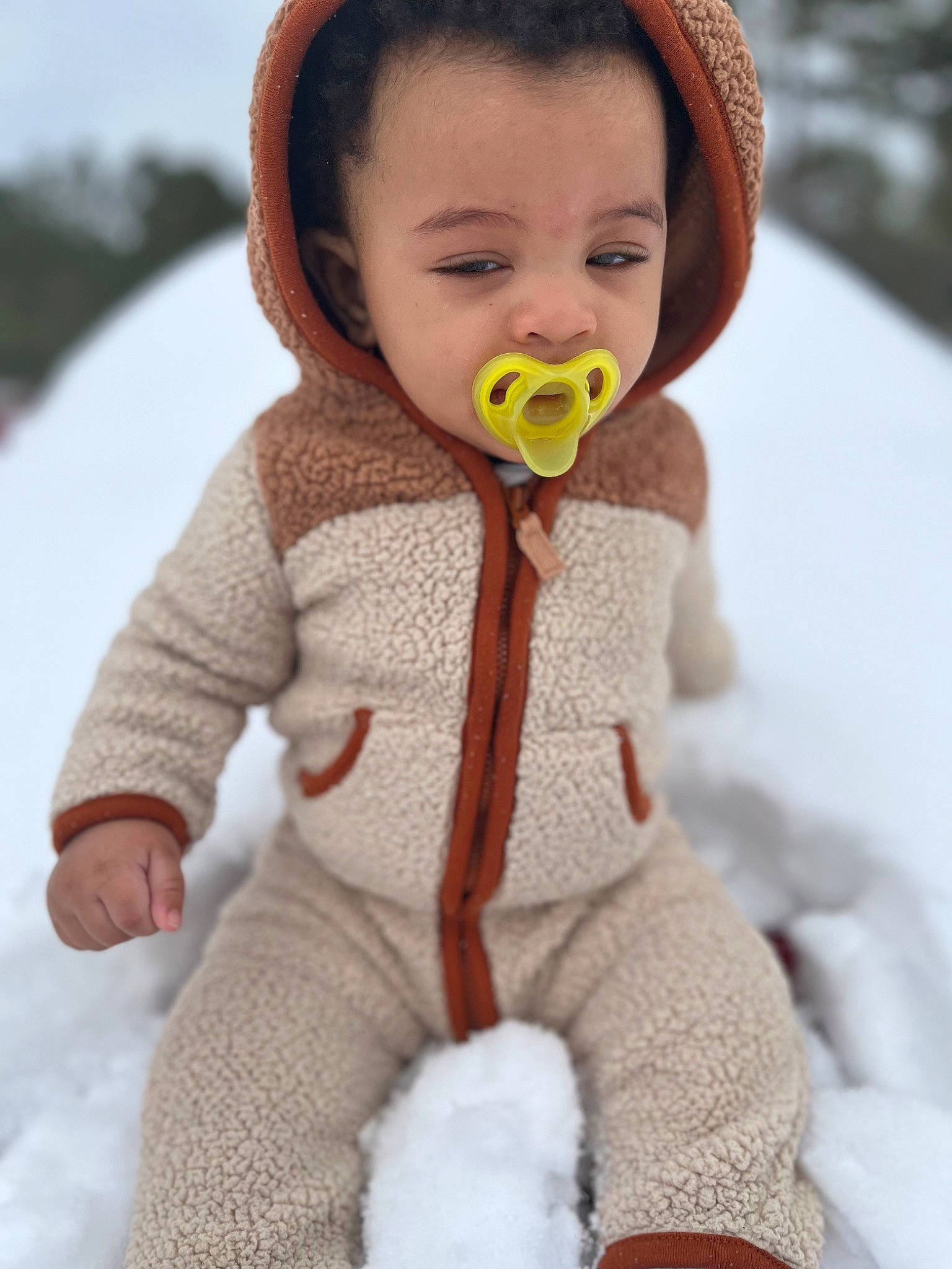 Ahmir is registered to the contest to win money with this photo: baby_toddler_clothing, cap, doll, eyelash, face, happy, hat, head, headgear, knit_cap, lip, nose, person, photograph, skin, sleeve, snow, textile, toddler, toy