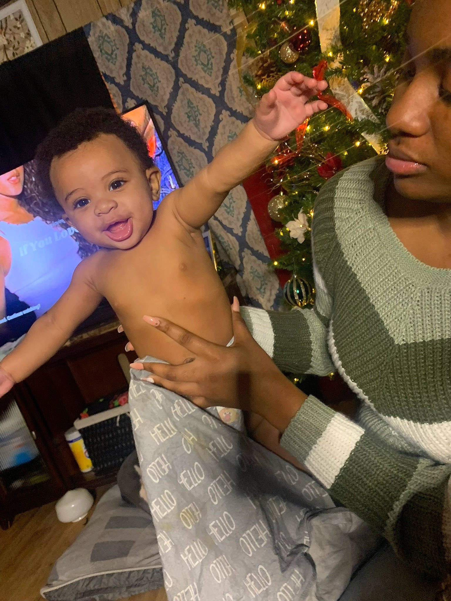 Ahmir joined the competition — help win amazing prizes! abdomen, barechested, chest, christmas_ornament, event, finger, fun, gesture, happy, holiday_ornament, jewellery, leisure, muscle, ornament, pattern, person, shorts, smile, thumb, toddler