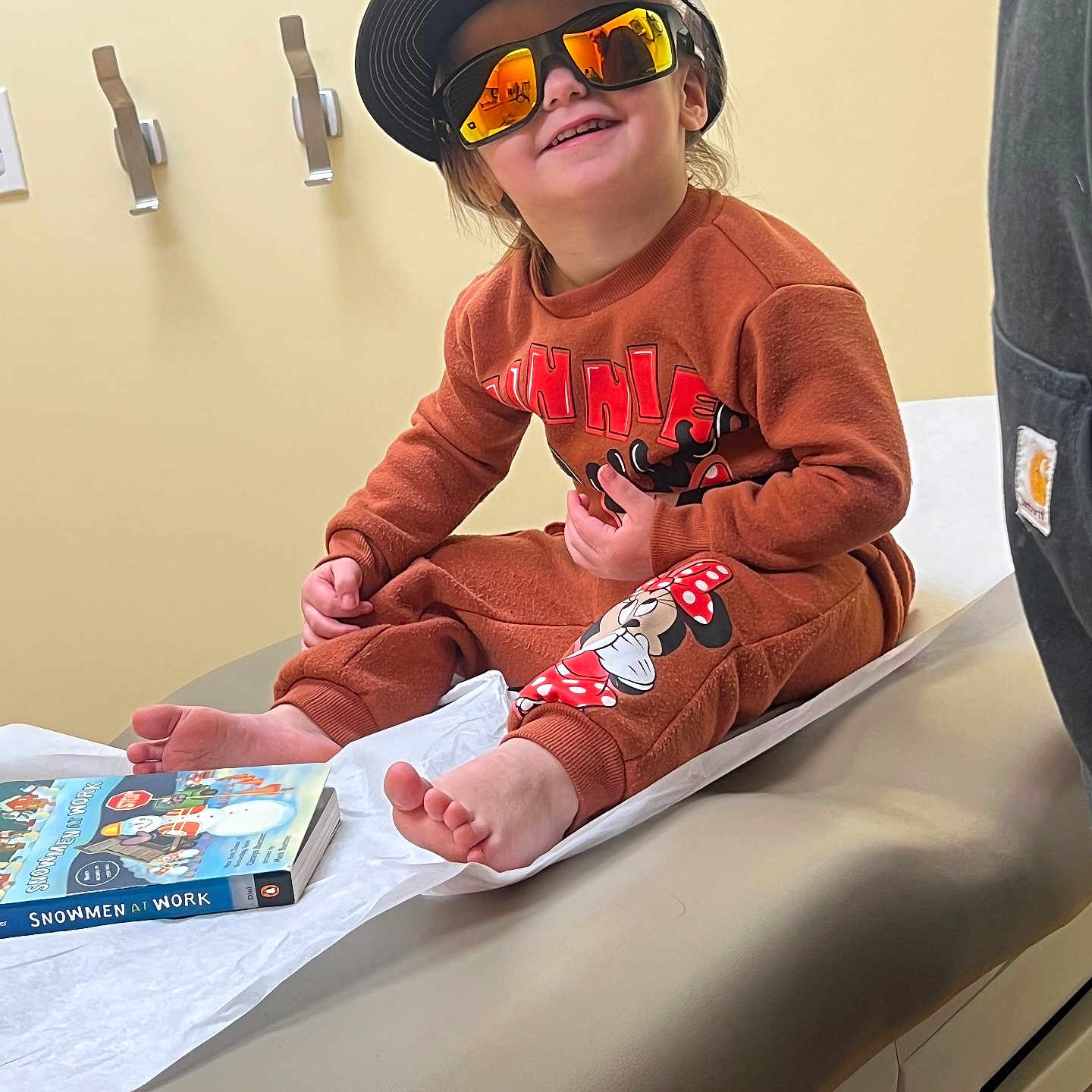 Harpper is registered to the contest to win money with this photo: accessories, advertisement, bodypart, child, clothing, face, female, finger, girl, happy, hat, head, person, photography, portrait, sitting, sleeve, smile, spa, sunglasses