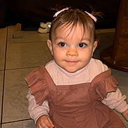 Aliyah a rejoint le concours — aidez-le/la à gagner de superbes lots ! toddler, child, baby, girl, sitting, floor, tile_floor, dress, sweater, tights, hair_bows, cute, indoor, portrait, young_child, smile, curious, small_hands, eyes, clothing