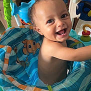 Lovannah participe au concours pour gagner de l'argent avec cette photo : baby, smiling, indoor, toy, colorful, disney_baby, activity_center, fish_toy, child, happy, playful, seat, infant, cute, closeup, face, person, fun, bright, cheerful