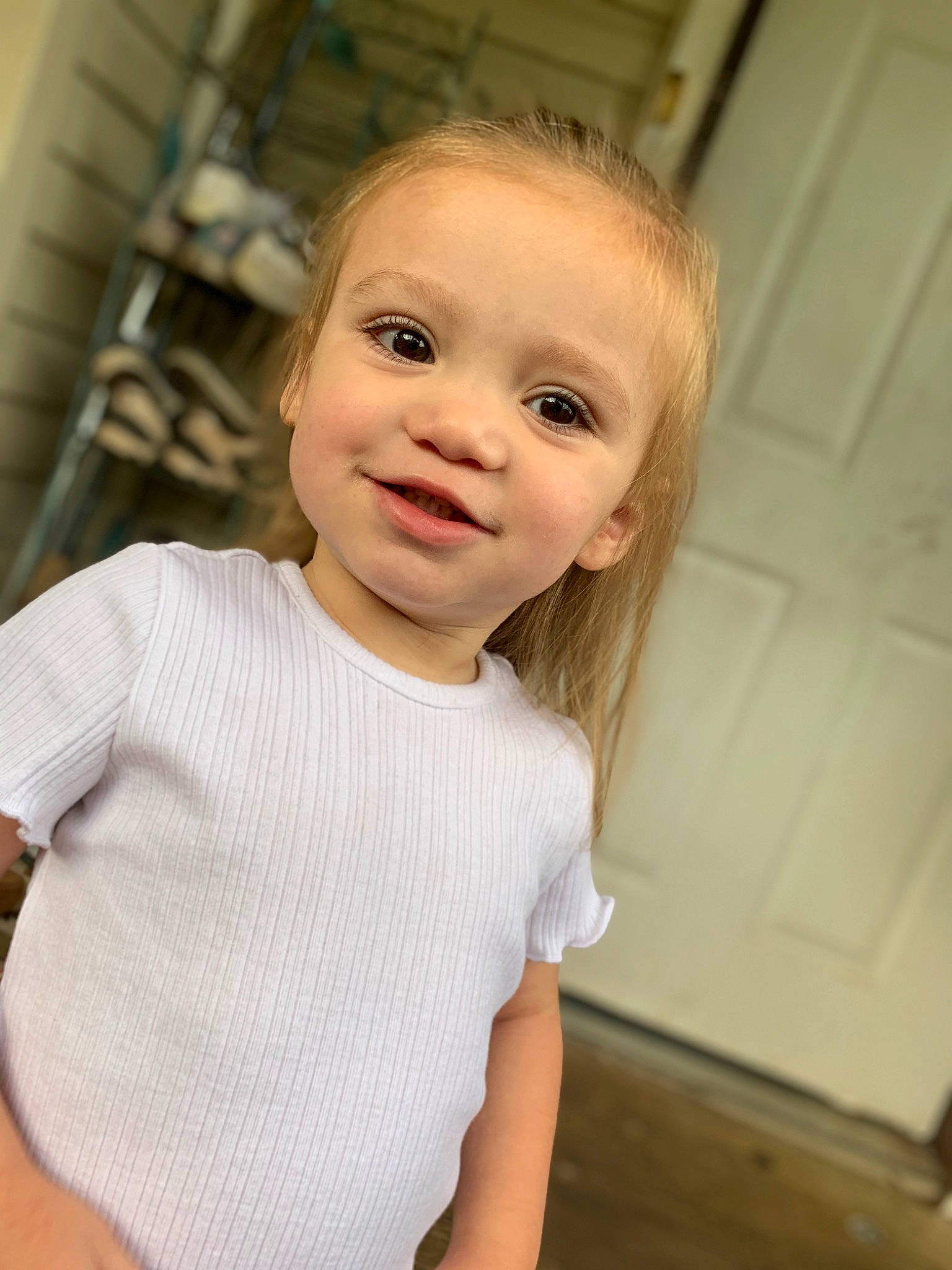 Sarah joined the competition — help win amazing prizes! baby, baby_toddler_clothing, blond, cheek, child, floor, flooring, happy, iris, joy, lip, neck, nose, pattern, person, skin, sleeve, smile, standing, t_shirt