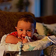 Jeremiah joined the competition — help win amazing prizes! baby, child, smiling, toy, indoor, seat, face, person, happy, infant, home, furniture, cute, closeup, chewing, decor, colorful, young, comfort, playful