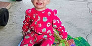 Rylee joined the competition — help win amazing prizes! toddler, child, pajamas, pink_clothing, smiling, play_mat, colorful, indoor, concrete_floor, cardboard_boxes, cleaning_tool, happy, sitting, cute, person, young_child, casual, joyful, face, feet