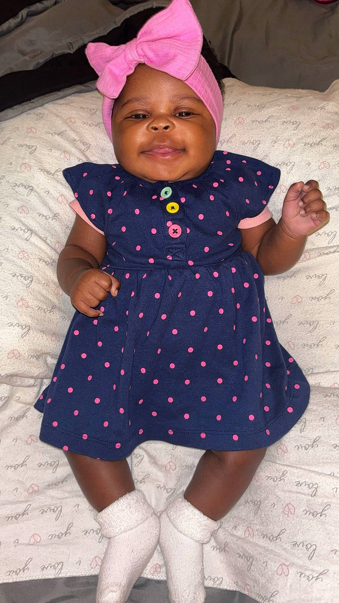 Haven joined the competition — help win amazing prizes! baby, blanket, bow, child, colorful_buttons, cozy, cute, dress, girl, happy, headband, indoor, infant, love_pattern, lying_down, polka_dot, portrait, smiling, sock, soft_texture