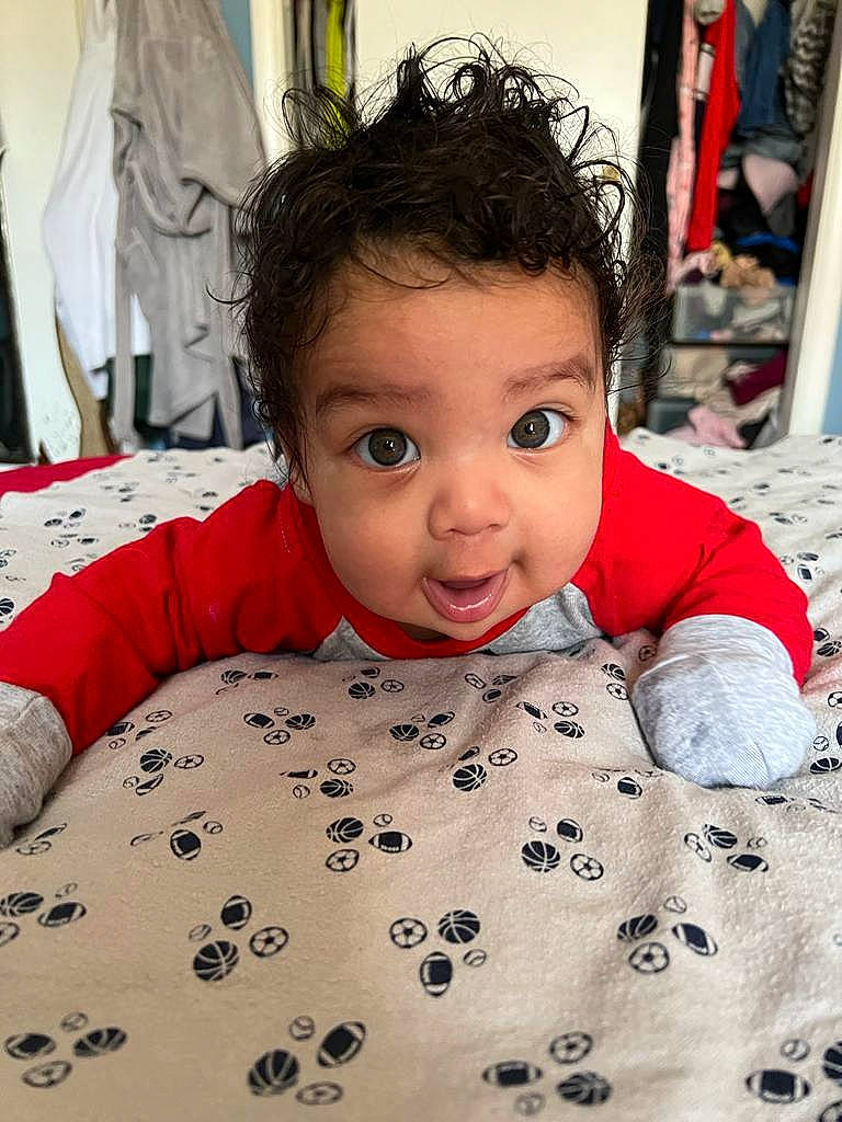 Brandon joined the competition — help win amazing prizes! baby, baby_toddler_clothing, cheek, child, chin, comfort, cool, eye, facial_expression, flooring, hairstyle, happy, iris, lip, nose, person, skin, sleeve, smile, surprise